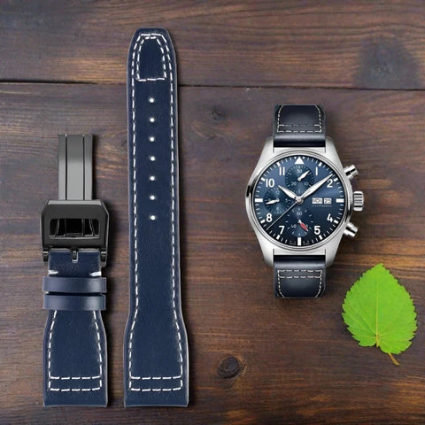 This is a blue pilot-style watch with the IWC Pilot leather strap with a black clasp. Made from quality cowhide.